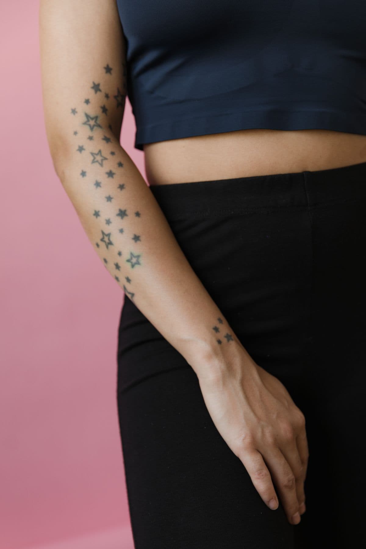 Small star tattoos on an arm