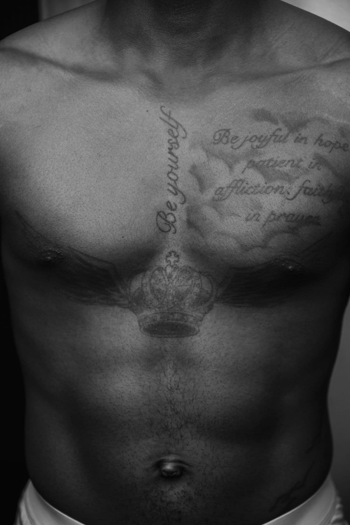 Black and white tattooed torso