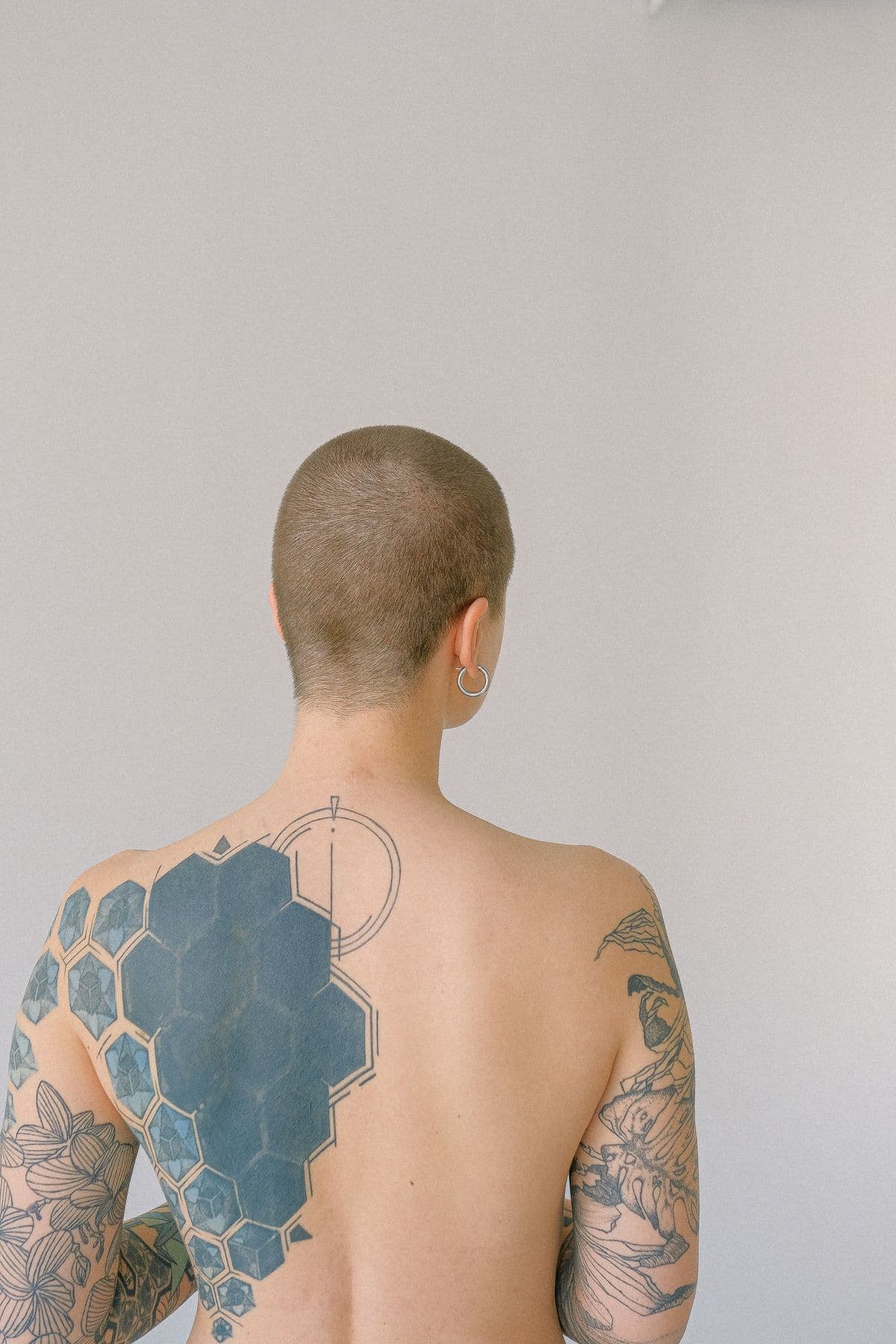 Geometric tattoo on an upper back